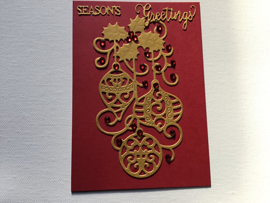 Lovely Christmas card with baubles and sparkle. CC615