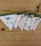 Mini bunting in a cute dinosaur theme ideal for party or room decoration - Image 1