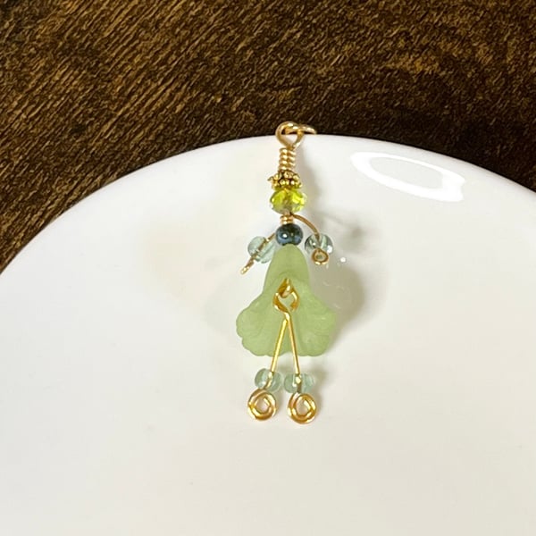 Little flower lady zip charm in floral green shades 