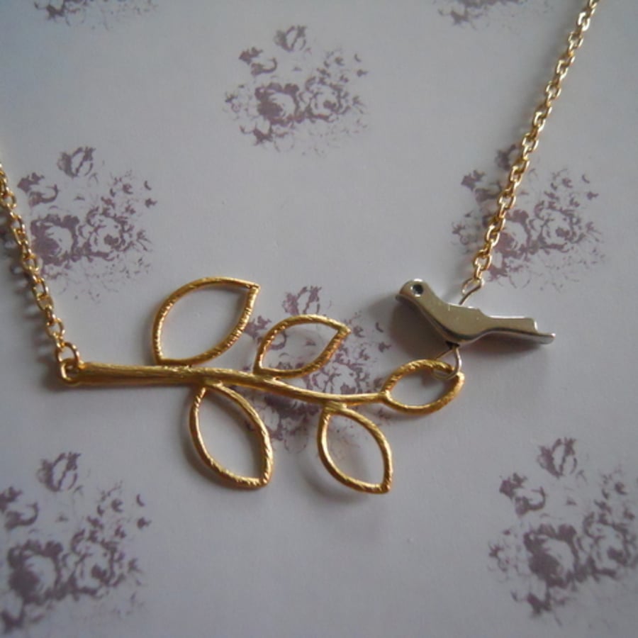  Gold and silver dove necklace