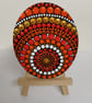 Hand painted red and orange mandala decorative piece - Image 1