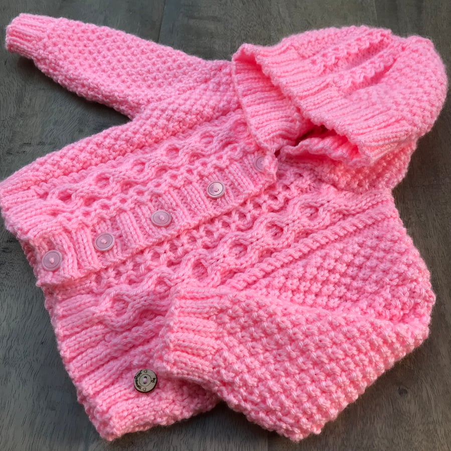 Hand knitted Girl's Aran Hooded Cardigan aged 6 - 12 months in Pink