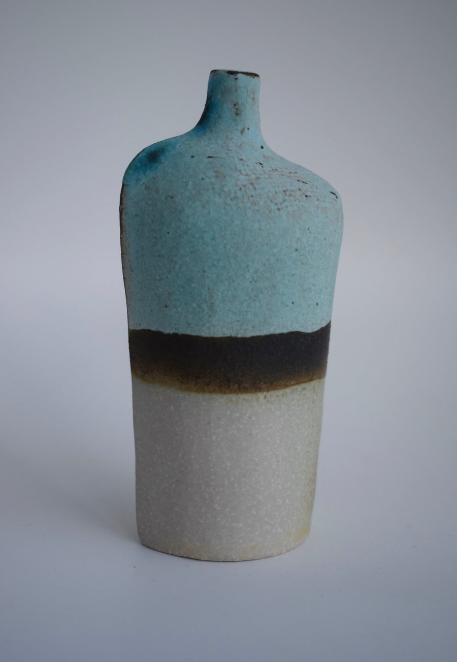 Tiny Figure Form Ceramic Bottle 