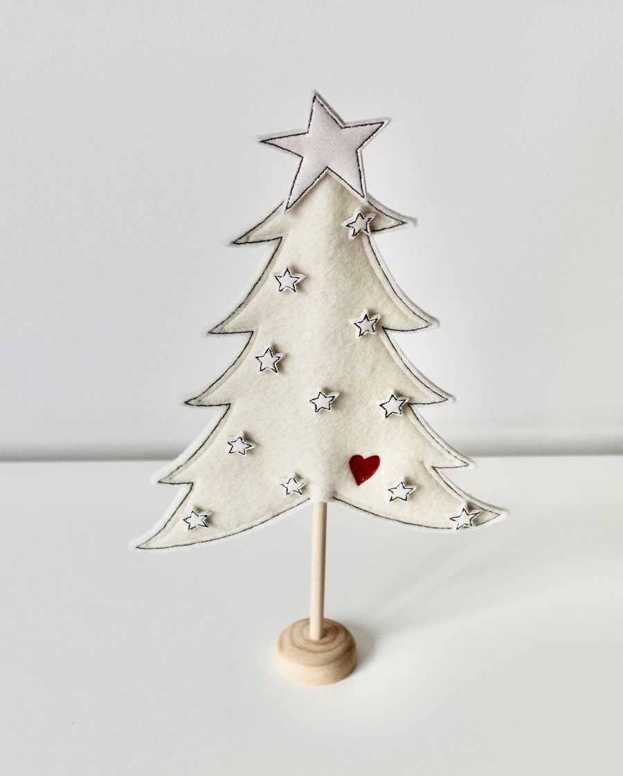 'A Large Christmas Tree with Iridescent Glitter Stars'