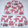 Baskets of Fruits on a red check  tea cosy and ovengloves