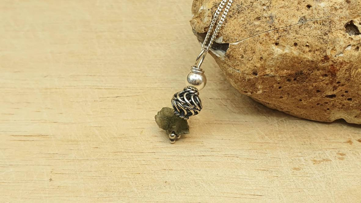 Small Raw Moldavite necklace. Reiki jewelry uk. Bali silver Wire wrapped pendant