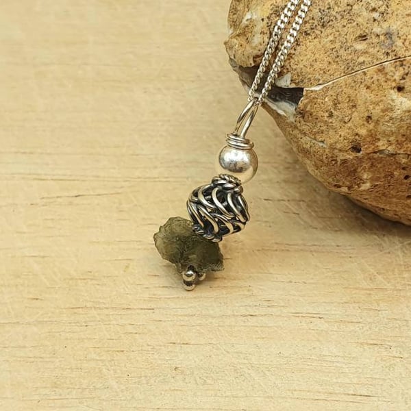 Small Raw Moldavite necklace. Reiki jewelry uk. Bali silver Wire wrapped pendant