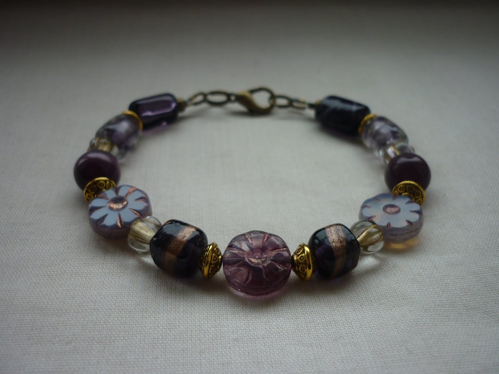 MAUVE, PURPLE, LILAC AND BRONZE BRACELET.  1087