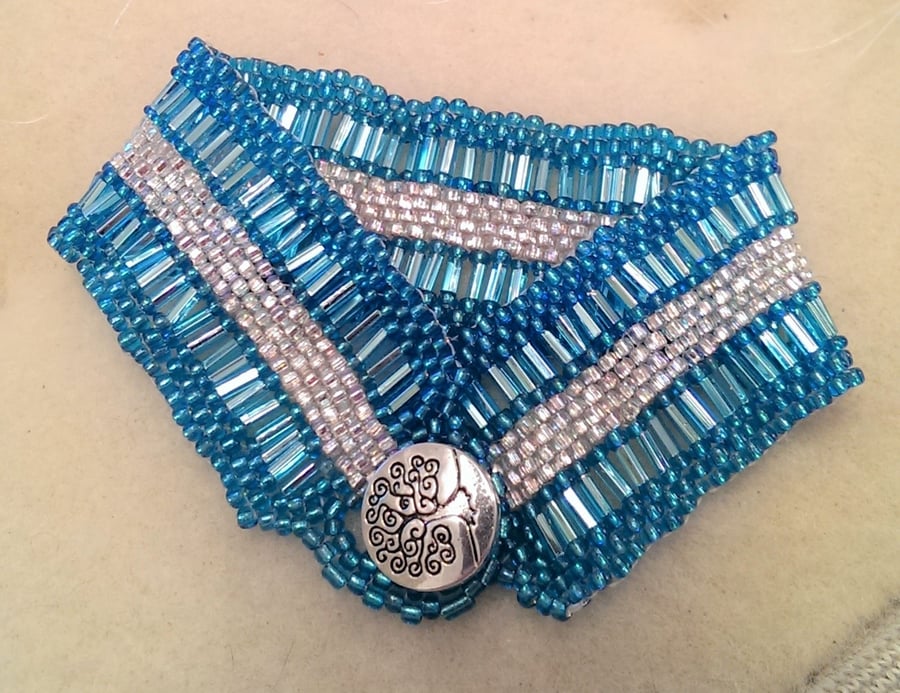 Turquoise and silver cuff style bracelet
