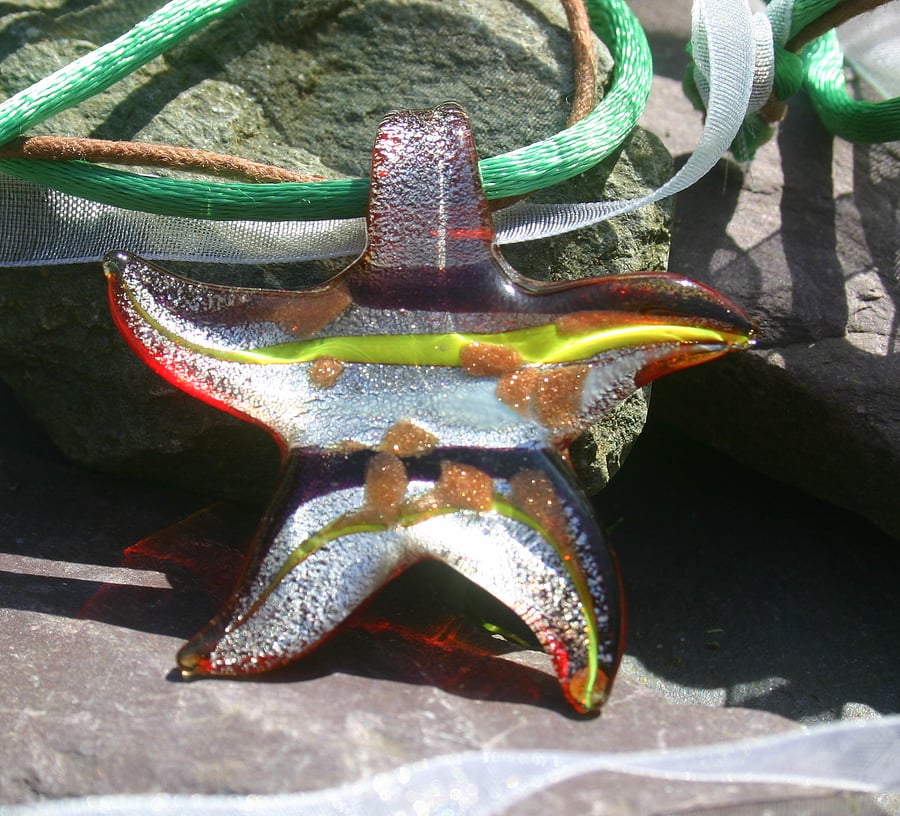 Sale 50% off. Glass star pendant strung on white ribbon, green satin cord.