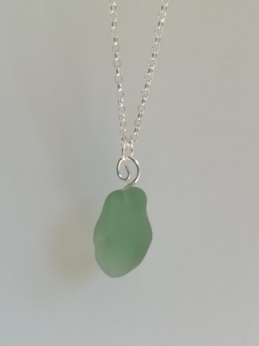 Green Sea Glass on a Silver Spiral Bail