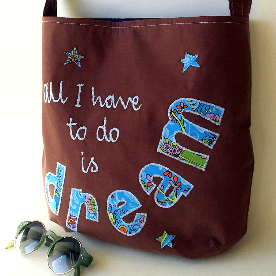 ‘Dream’ crossbody bag in brown and blue with adjustable strap