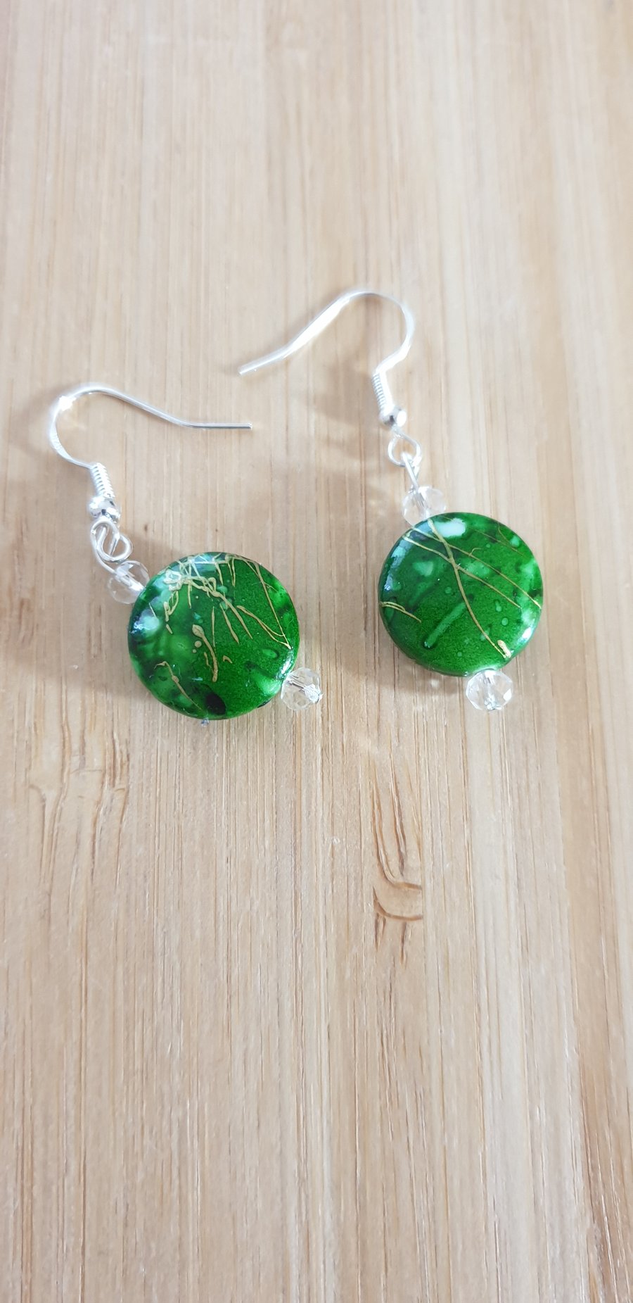 Green round earrings