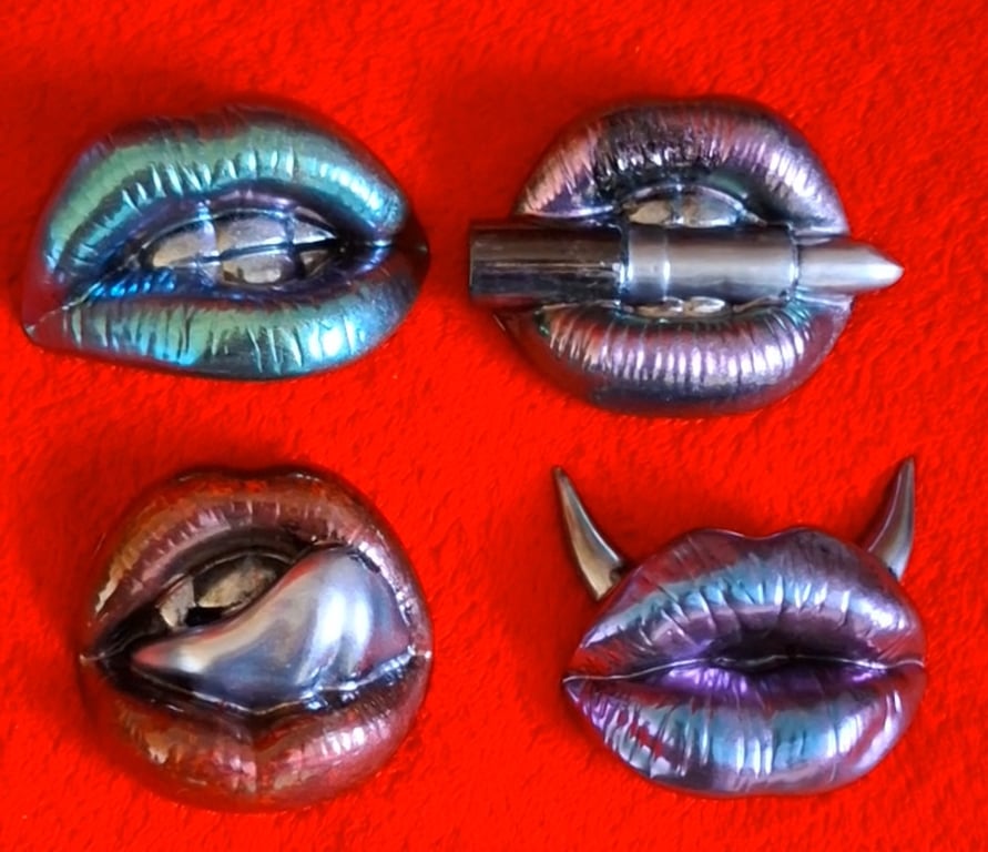Handmade epoxy resin fridge magnet 'lips'.