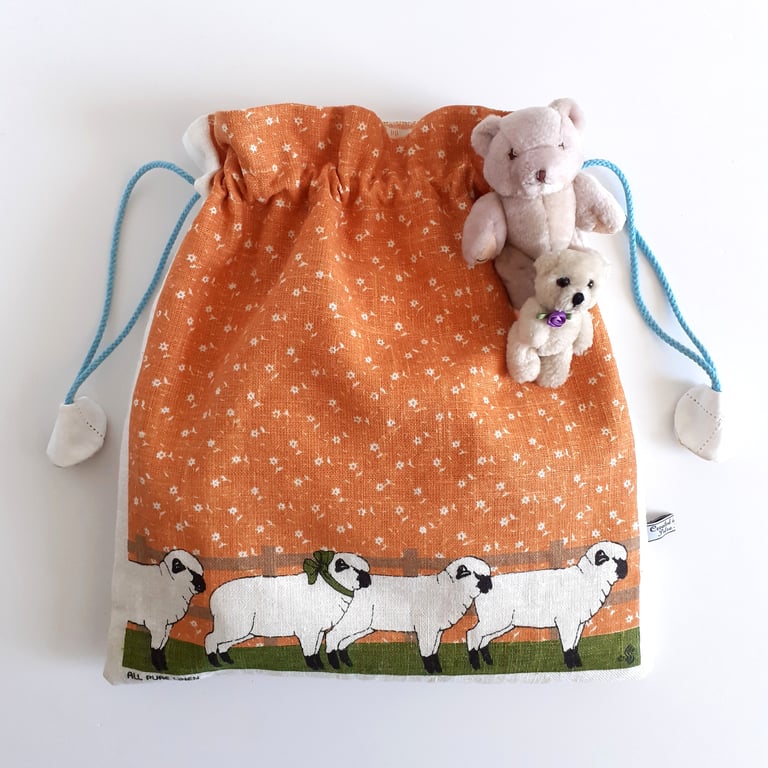 Upcycled drawstring bag from a vintage tea towel with sheep print
