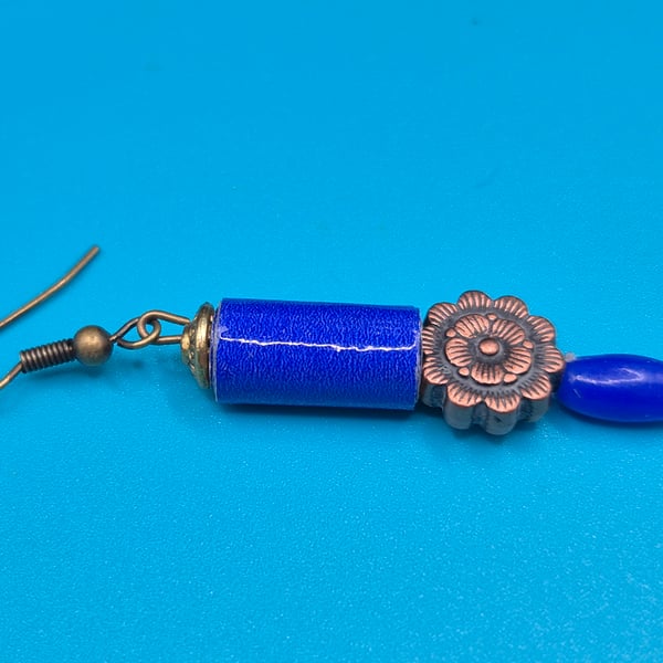 Midnight blue paper beaded earrings with bronze tone flower bead
