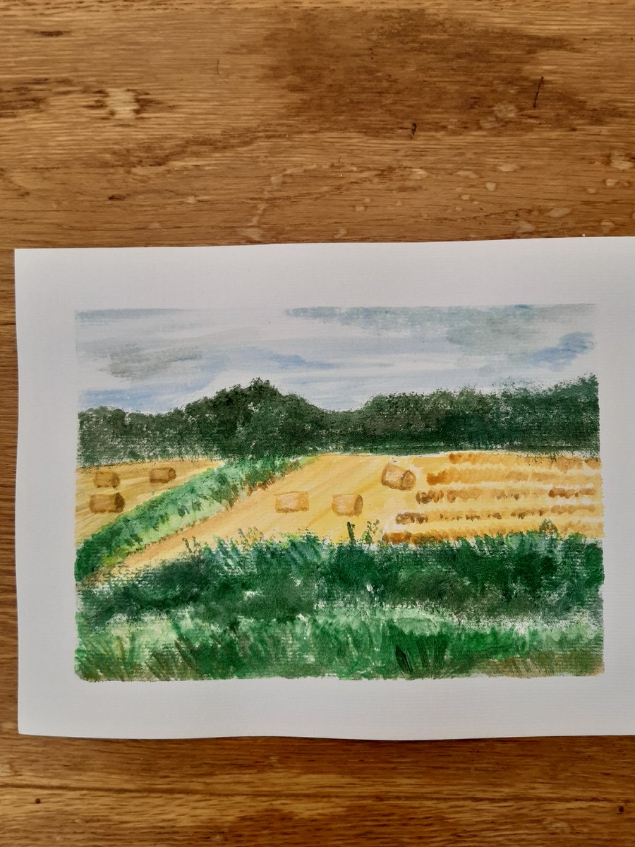Painting watercolour farm field .The bales of hay 