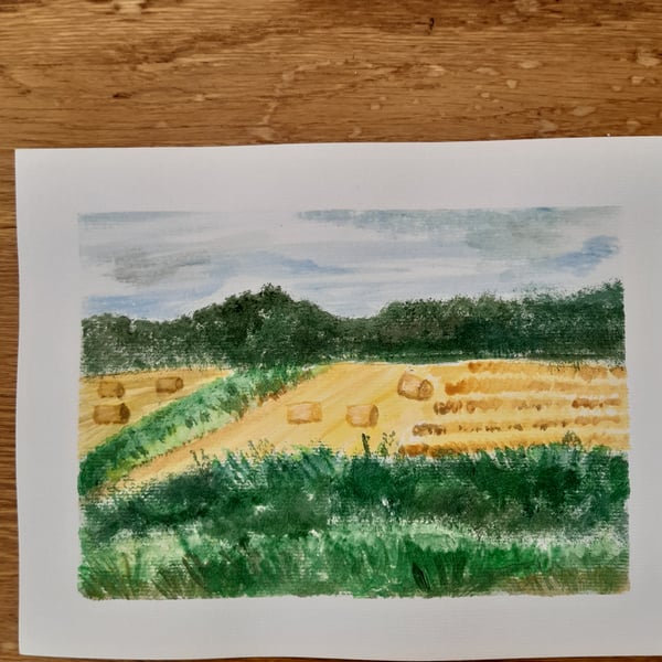 Painting watercolour farm field .The bales of hay 