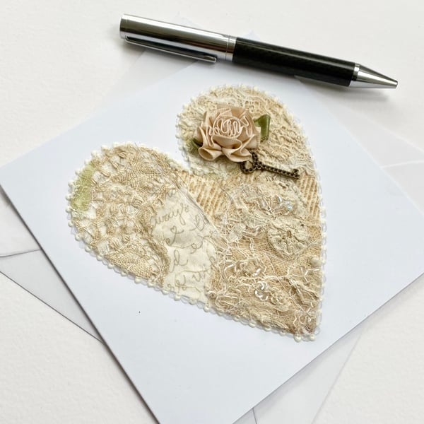 Up-cycled vintage lace embroidered heart card with rose and key. 