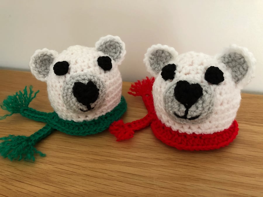 A Pair of Crochet Polar Bear Chocolate Orange Covers