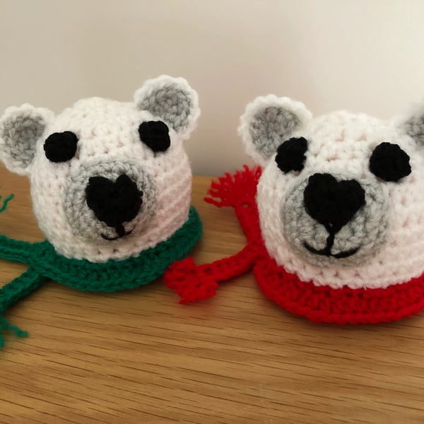 A Pair of Crochet Polar Bear Chocolate Orange Covers