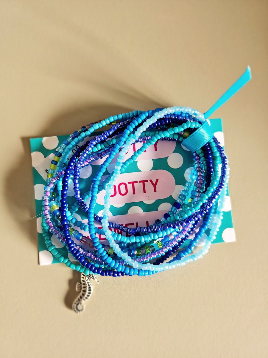 Blue beaded stretchy bracelets.