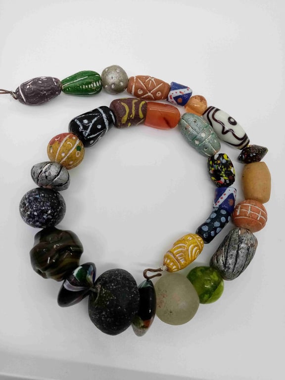 A strand of chunky beads, mostly from Africa, for reuse