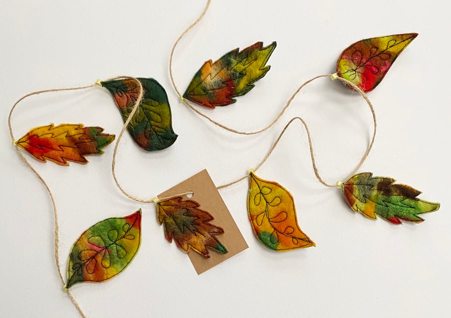 Felted embroidered autumn leaf garland or bunting home decorations. 