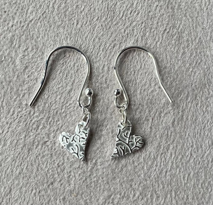 Small heart, pure silver earrings on sterling silver ear wires. 