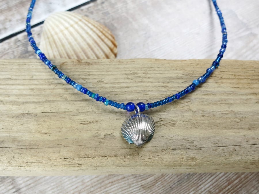Seed Bead Necklace with a Silver Coated Cornish Cockle Shell - Blue Beads