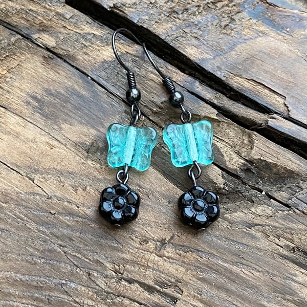 Turquoise butterfly & black flower beaded earrings 