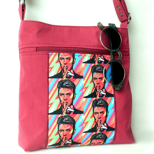 Red David Bowie crossbody bag with adjustable strap