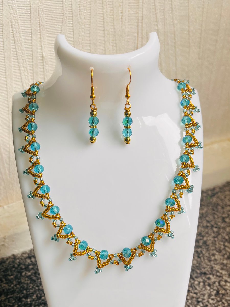 Blue  glass  Rondelle and seed Bead earrings and Necklace set 16"