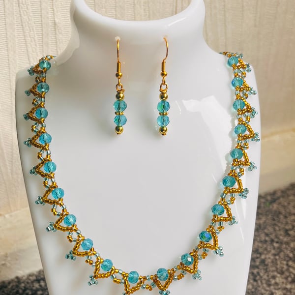 Blue  glass  Rondelle and seed Bead earrings and Necklace set 16"