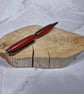 Hand Turned Epoxy Twist Pen - Red and Purple with Gun Metal Plating - Image 2