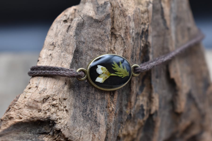 Image of Adjustable Resin Bracelet with Pressed Bud and Leaf, Waxed Cotton Cord