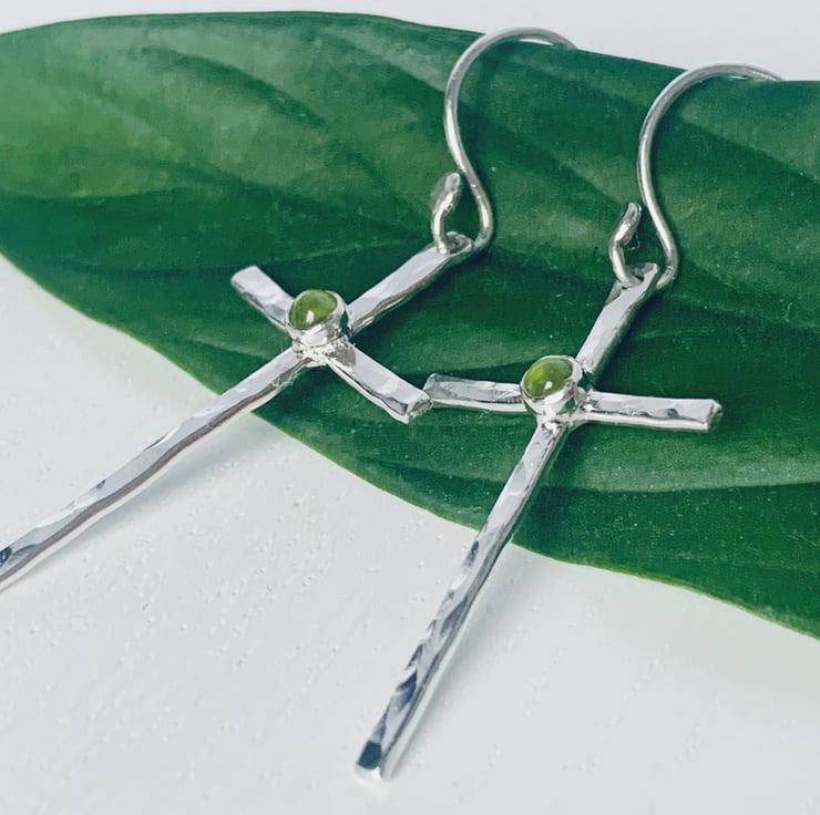 Silver cross sales drop earrings