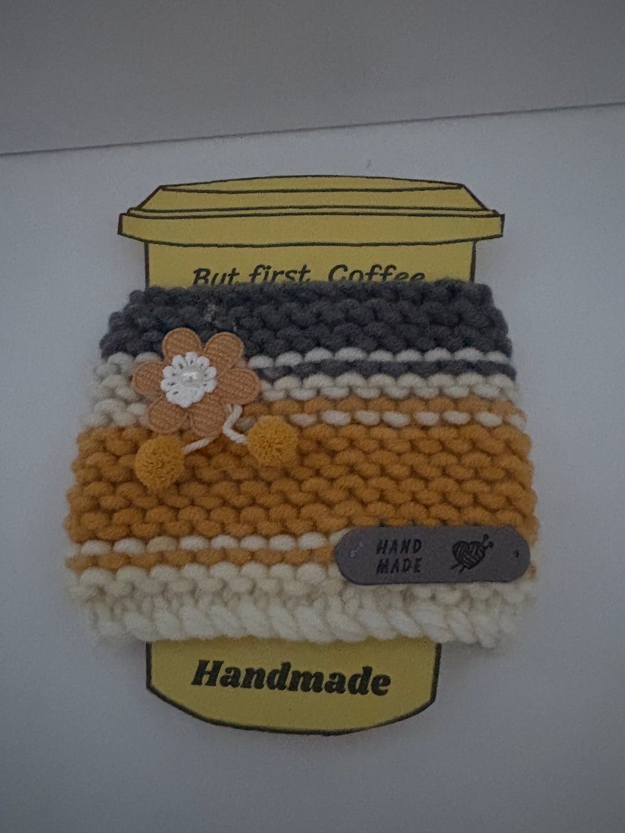 Autumn knitted cup cosy. 