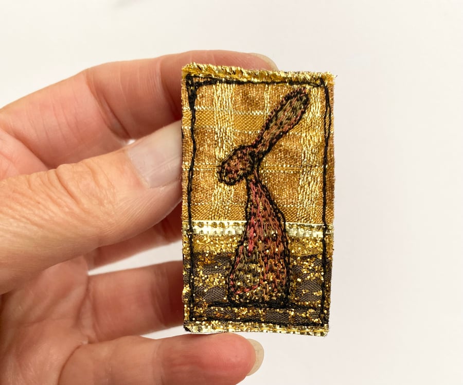 Upcycled hare brooch pin or badge. 