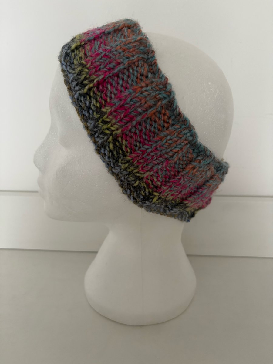 Hand knitted headband. 