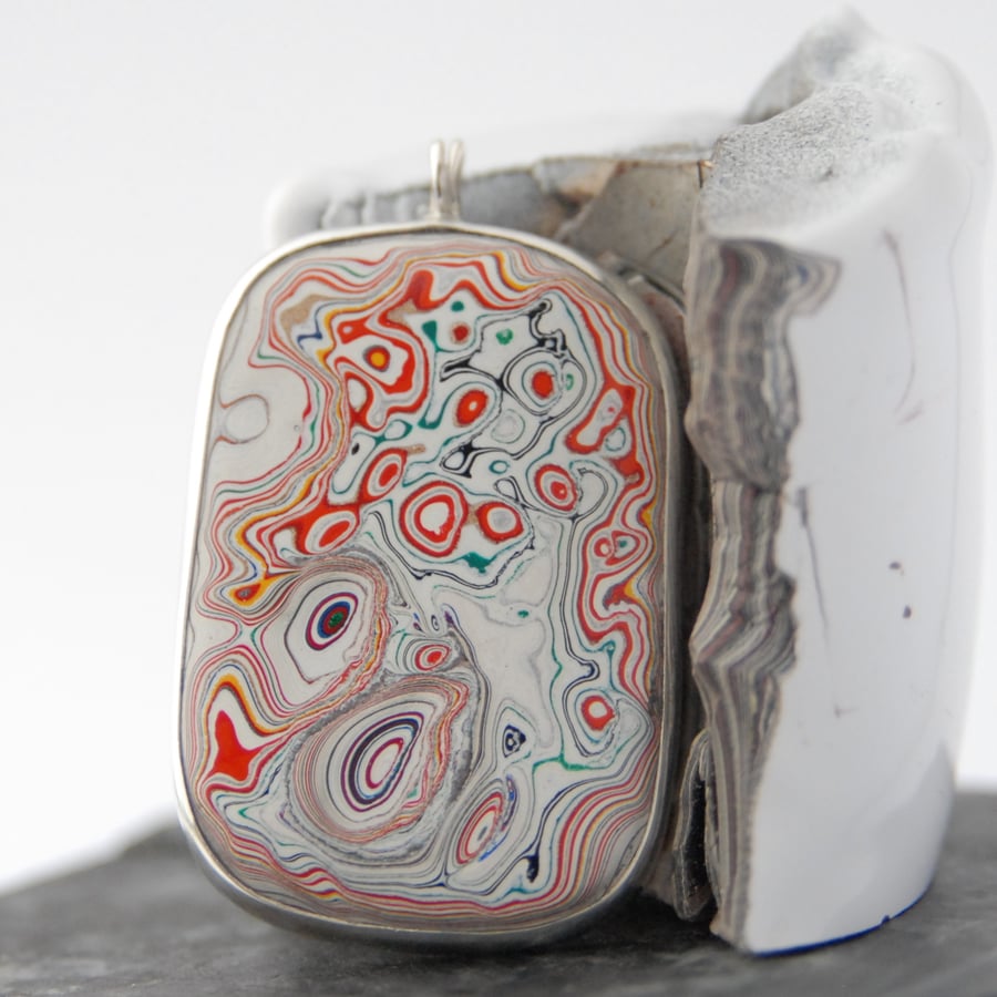 Super swirly oblong fordite and sterling silver pendant