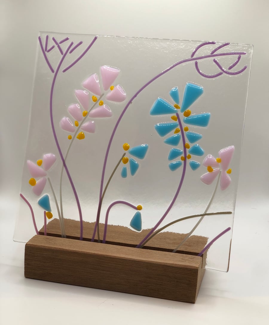 Fused glass abstract flower panel - blue and pink - wooden stand