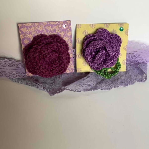  2 pretty purple crochet brooches 
