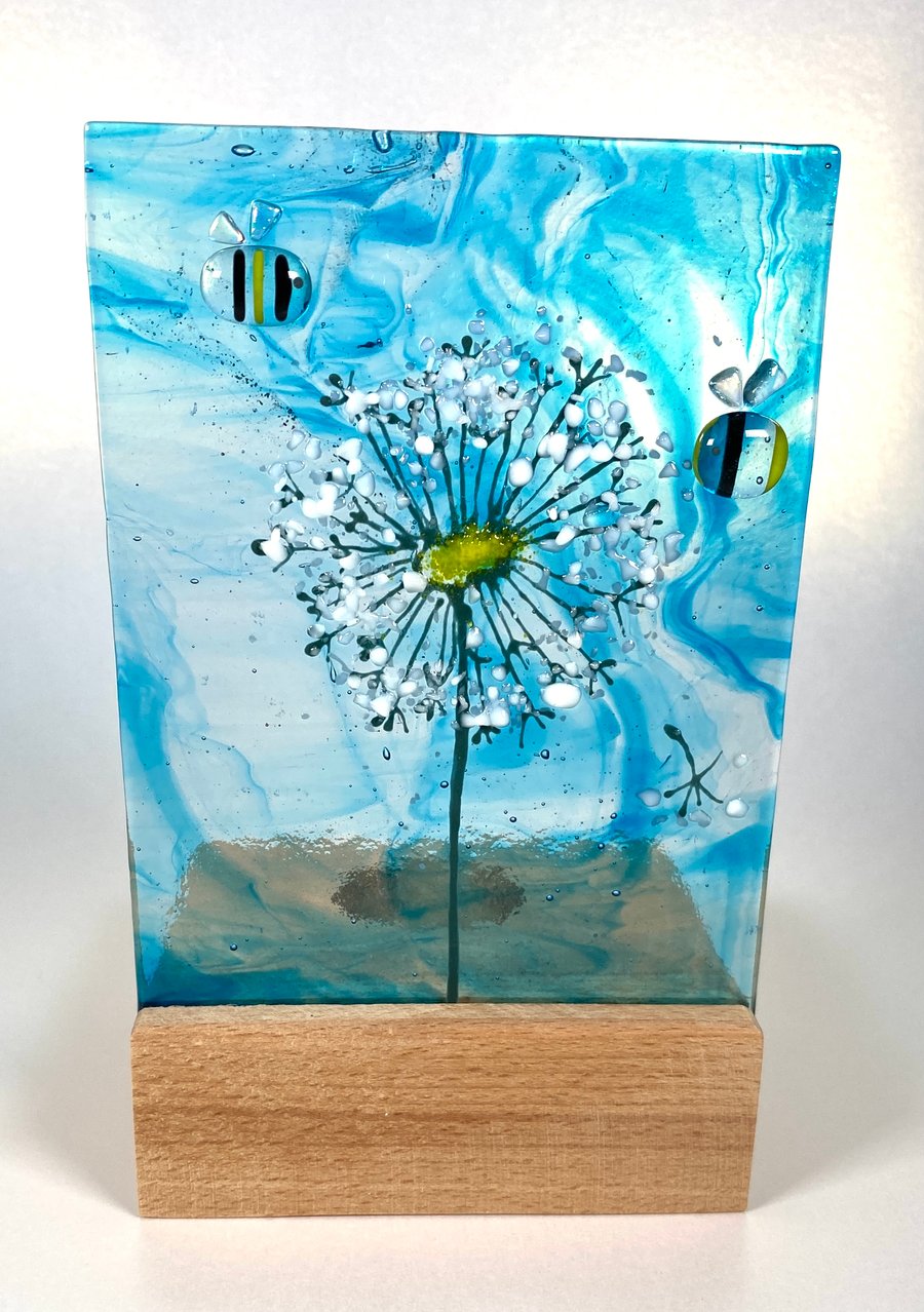 Dandelion and bees fused glass panel in oak base 