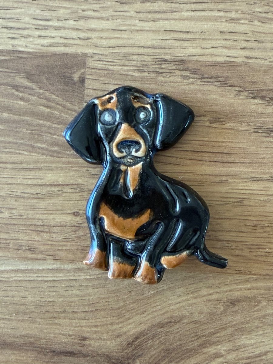 Handmade ceramic dachshund fridge magnet