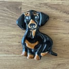 Handmade ceramic dachshund fridge magnet