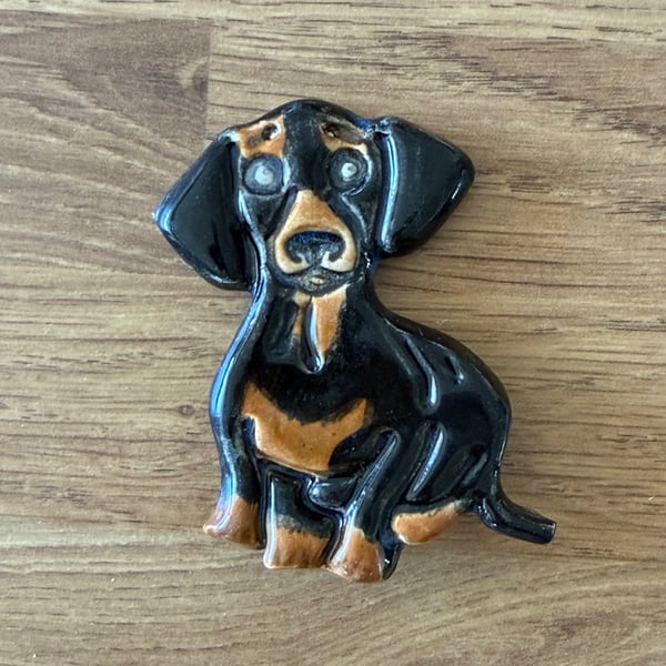 Handmade ceramic dachshund fridge magnet