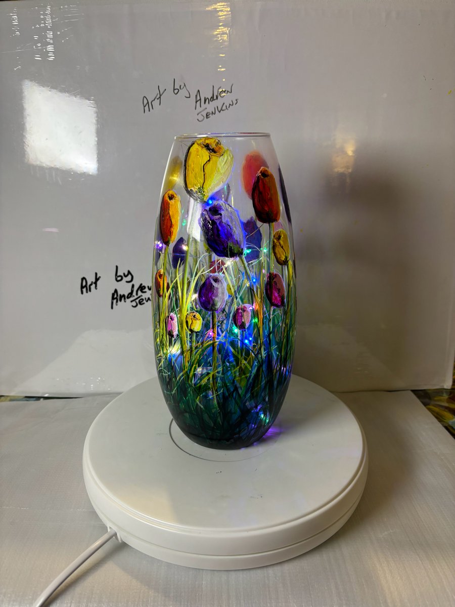 A hand painted and fired glass vase by Andrew Jenkins 