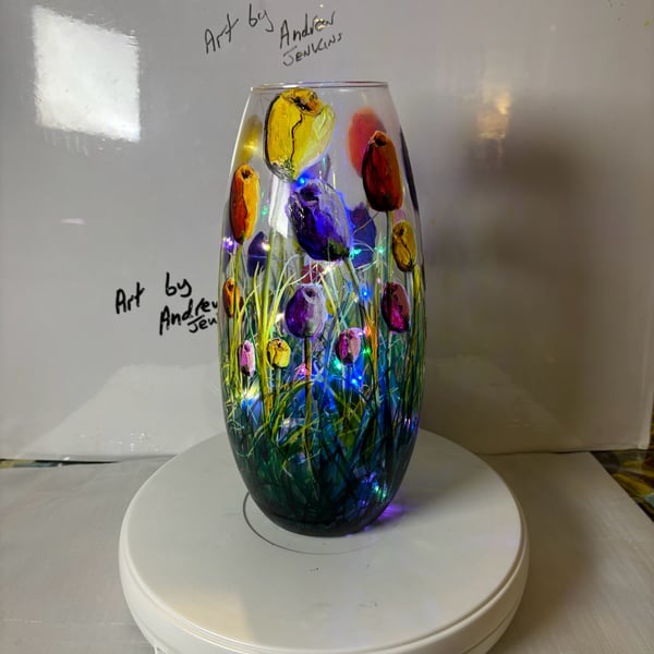 A hand painted and fired glass vase by Andrew Jenkins 