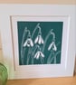 An original handprinted linoprint of snowdrops.